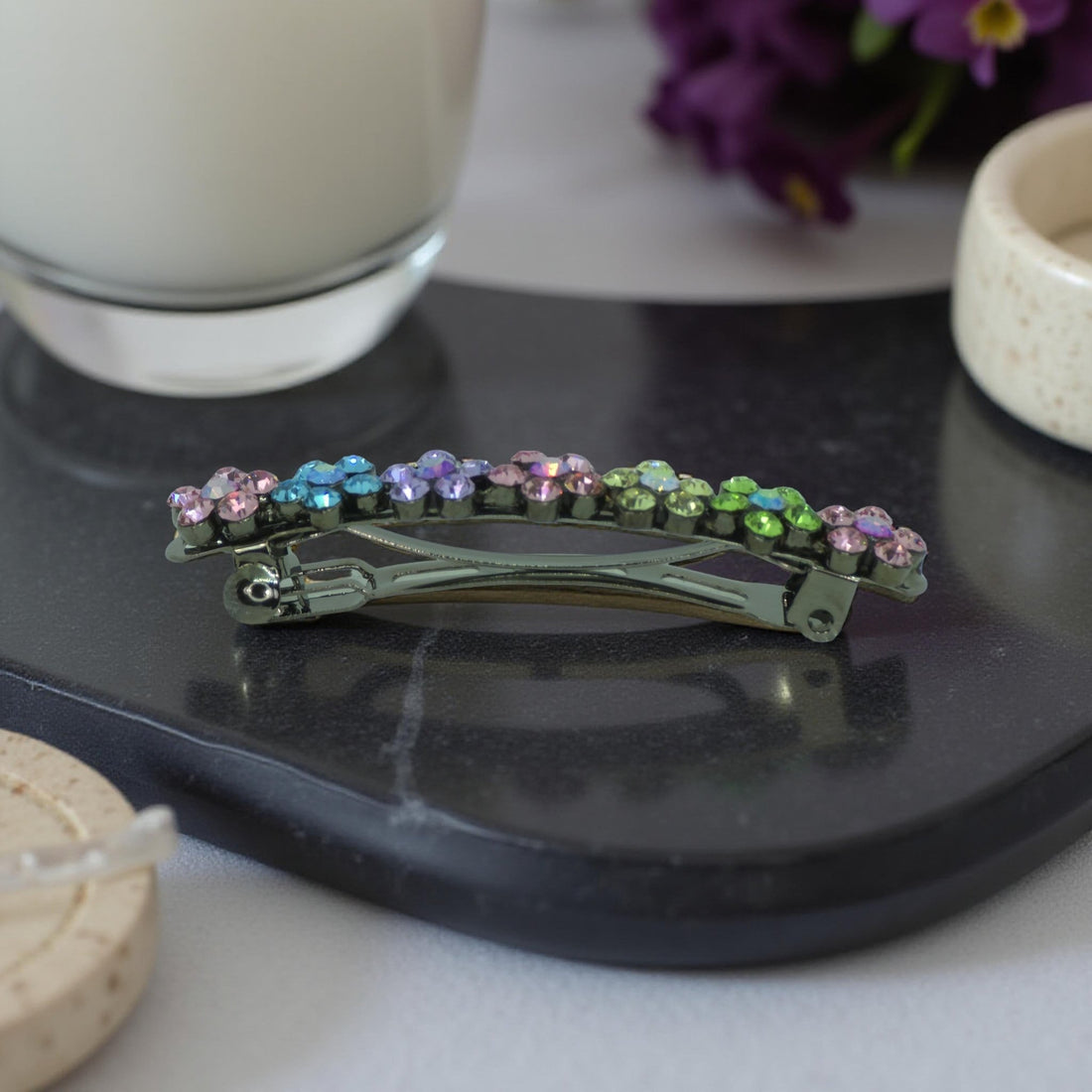 Side view of Haerime FloraDot Row Barrette in Rainbow – arch structure with radiant multicolor crystal petals