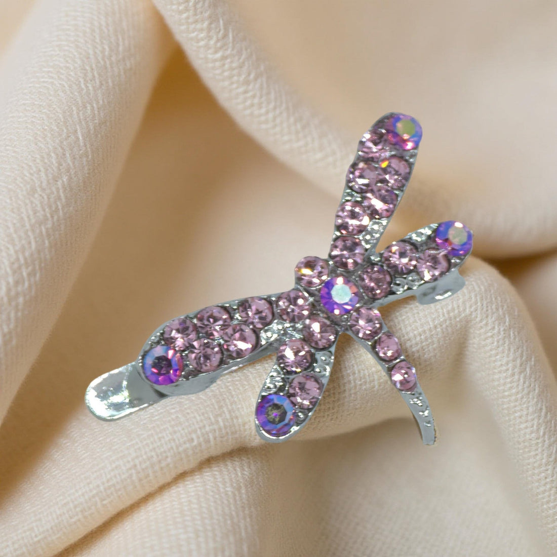 Delicate pink crystal wings of the Haerime Aeris Wing Clip – detail angle