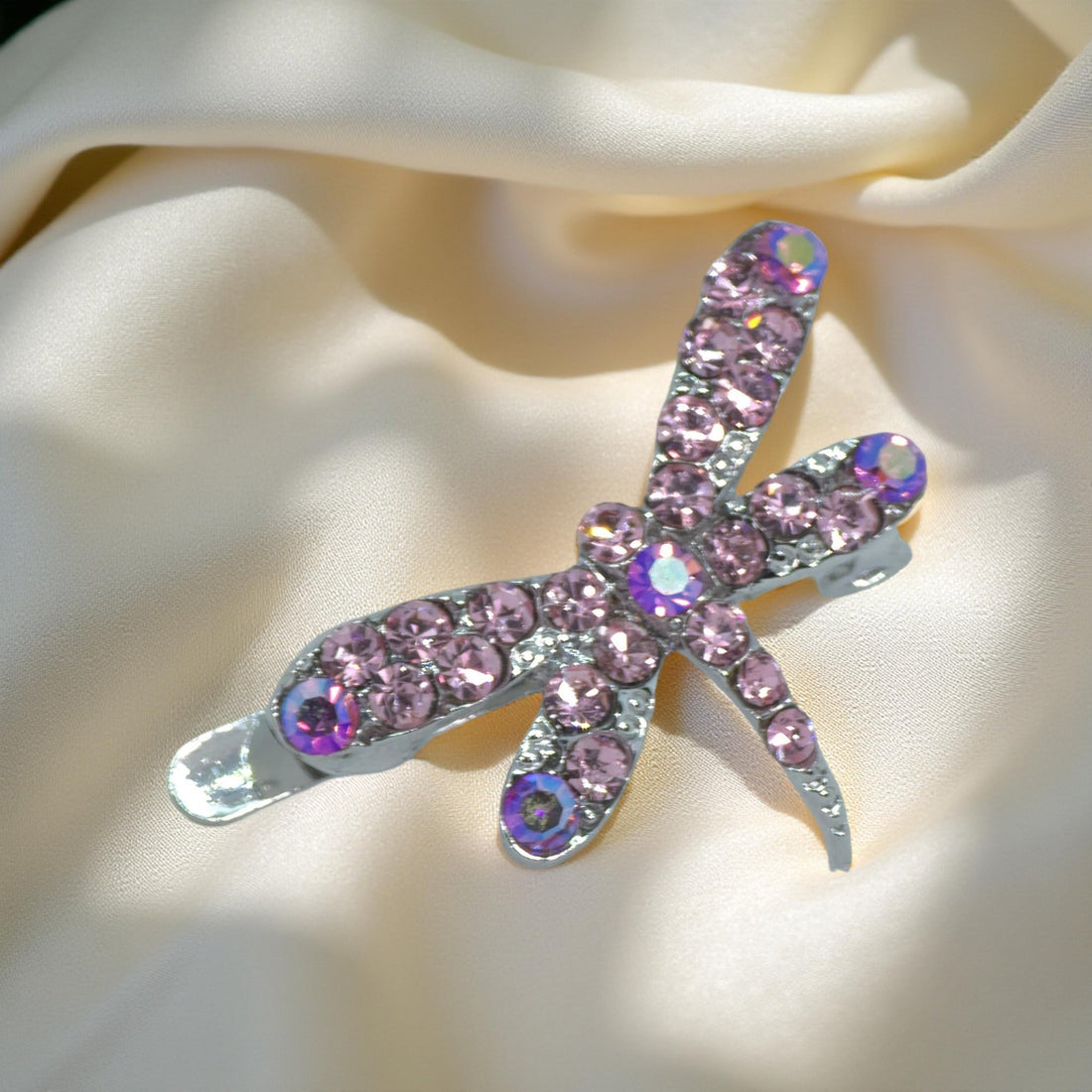 Pink version of Haerime Aeris Wing Clip – crystal dragonfly barrette with magnetic clasp