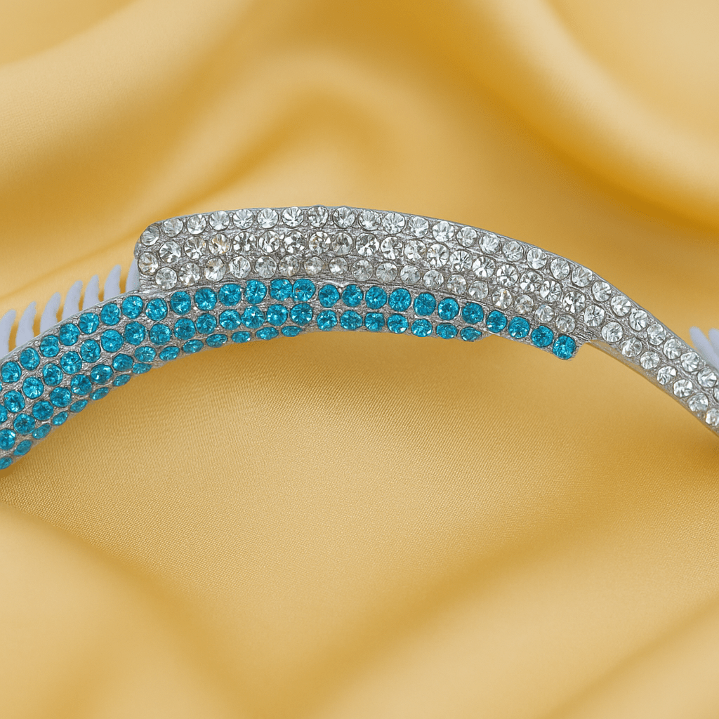Close-up of pavé crystals on Haerime Aurelya Dual Arc Comb in Blue Zircon – sparkling layered arcs