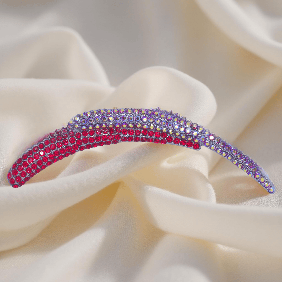 Haerime Aurelya Dual Arc Comb in Red showing curved pavé design and dual arc silhouette