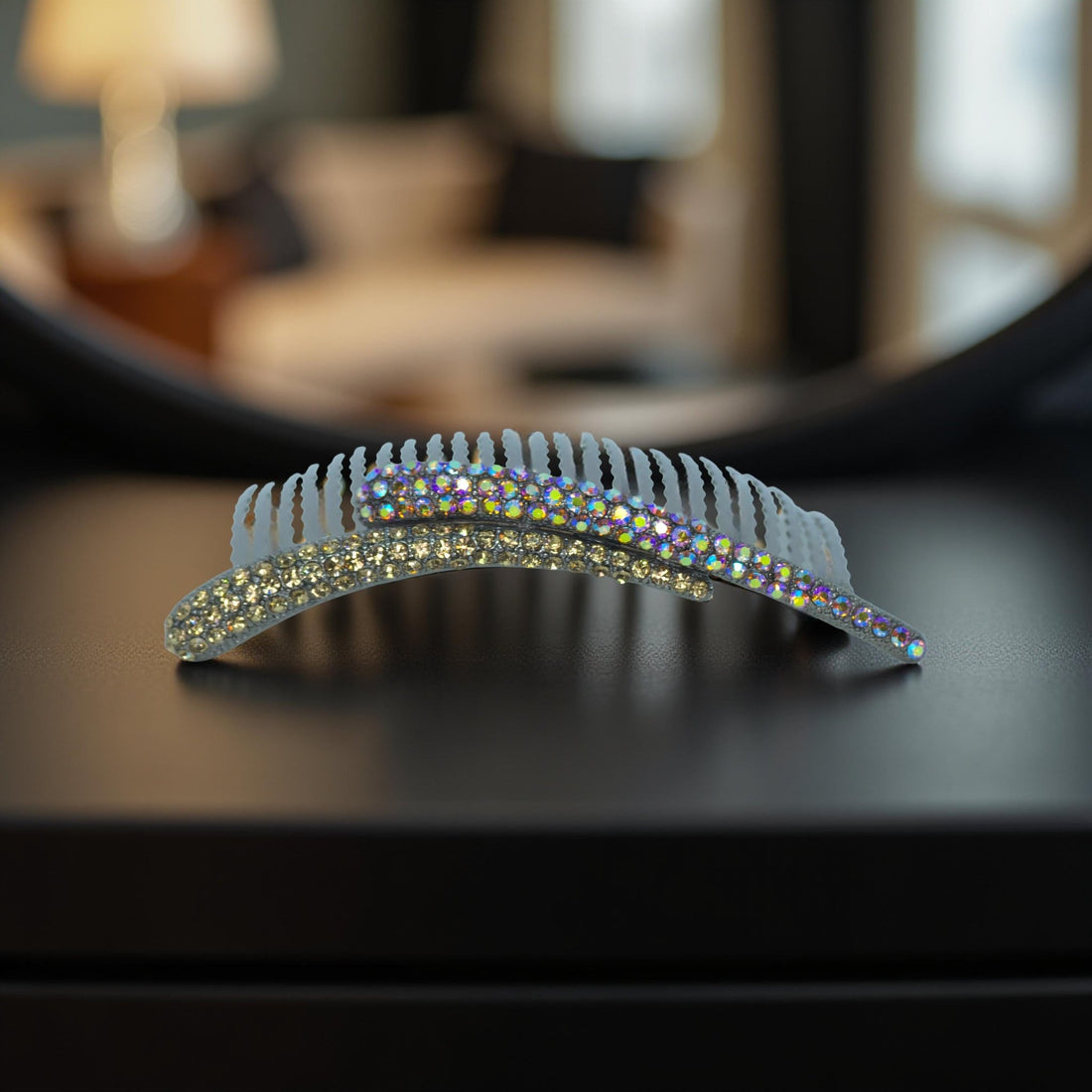 Haerime Aurelya Dual Arc Comb in Smoky Gold showing curved pavé design and dual arc silhouette
