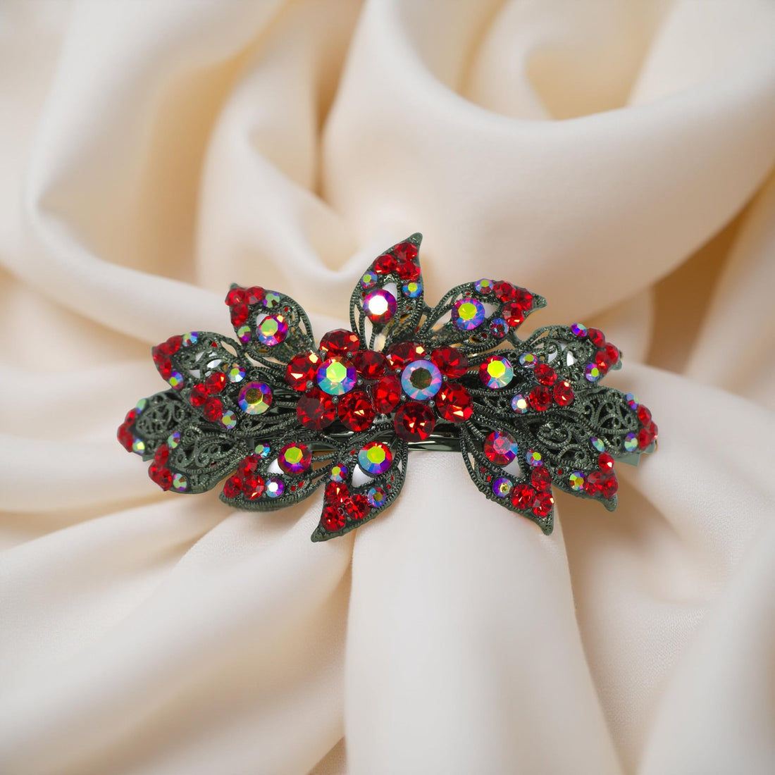 : Haerime Aurora Filigree Barrette in Red showing antique lace petal detail and clustered Austrian crystals