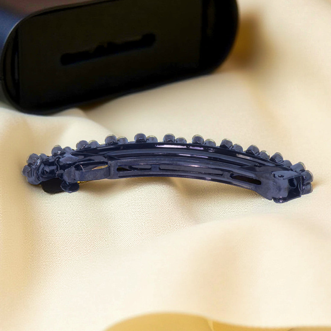 Back view of Haerime Blosselina Row Barrette in Clear – French clip closure and flower setting