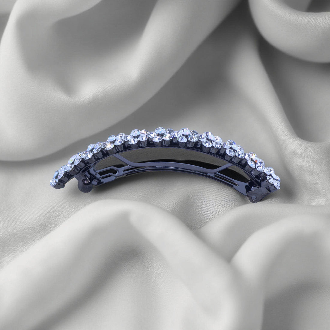 Horizontal side view of Haerime Blosselina Row Barrette in Clear – soft arch and crystal arrangement