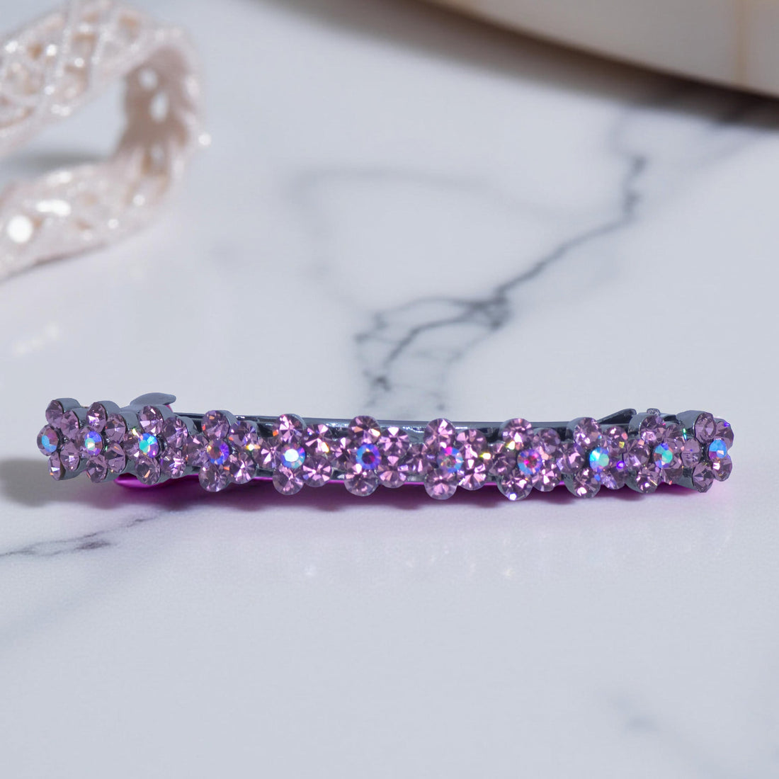 Purple version of Haerime Blosselina Row Barrette – radiant everyday elegance