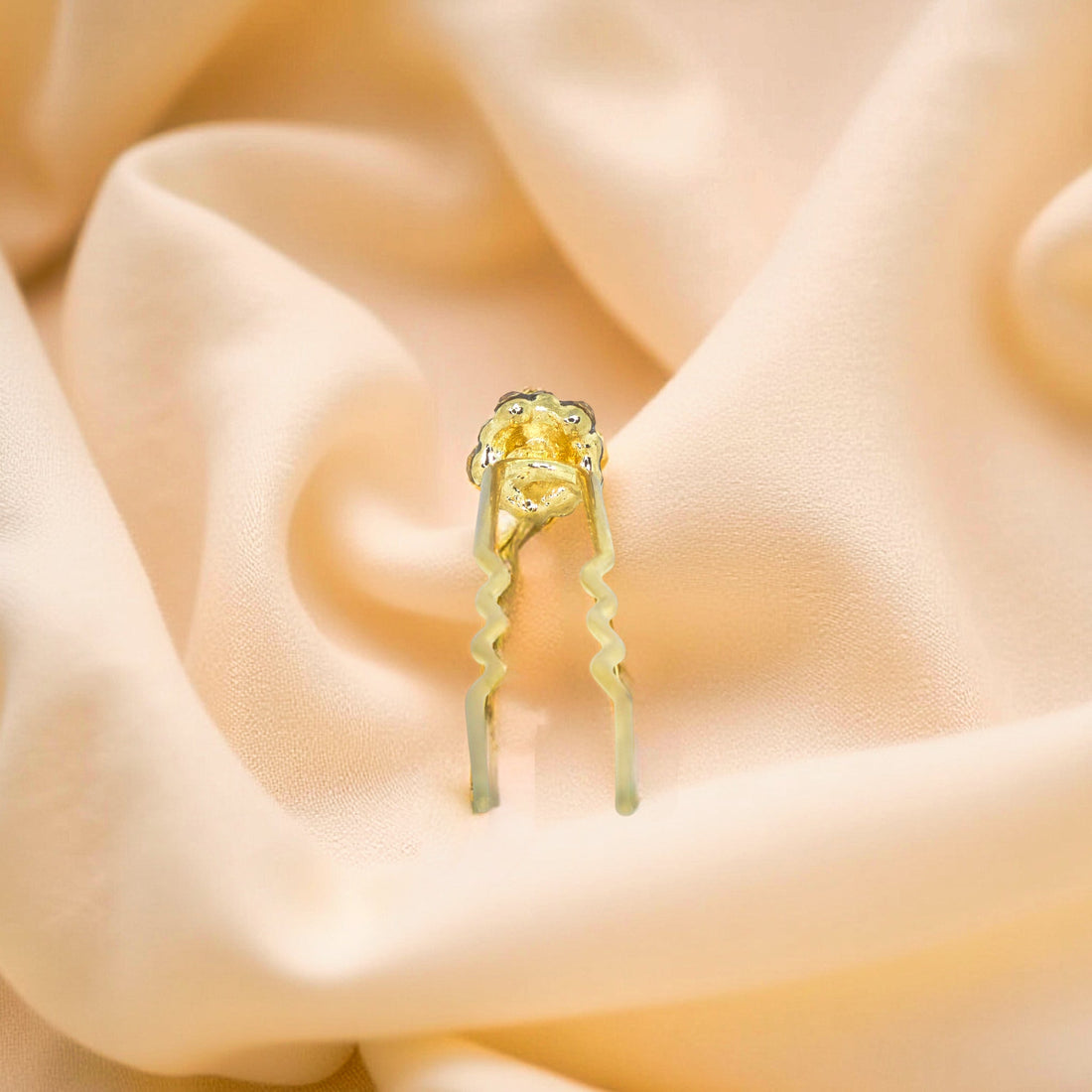 Back view of Haerime Celestique Pin in Amber – curved base and crystal dome reflection