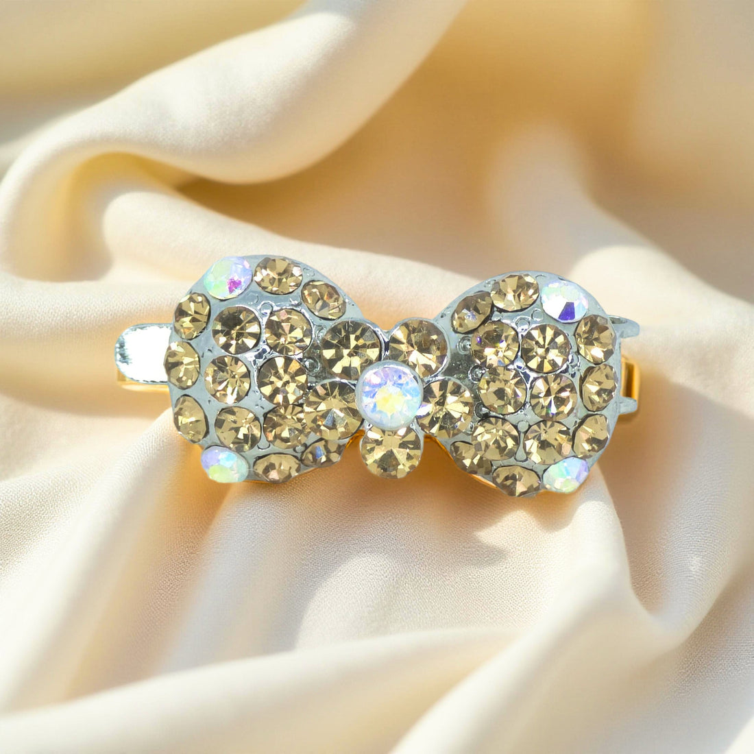Amber version of Haerime Chérie Clip – magnetic mini bow hair clip with crystal detailing