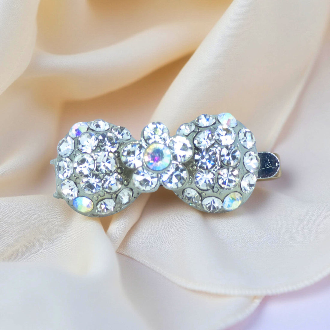 Clear version of Haerime Chérie Clip – magnetic mini bow hair clip with crystal detailing