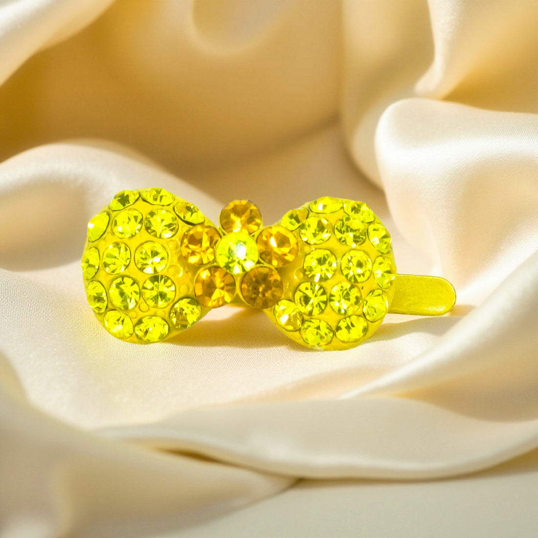 Yellow version of Haerime Chérie Clip – magnetic mini bow hair clip with crystal detailing