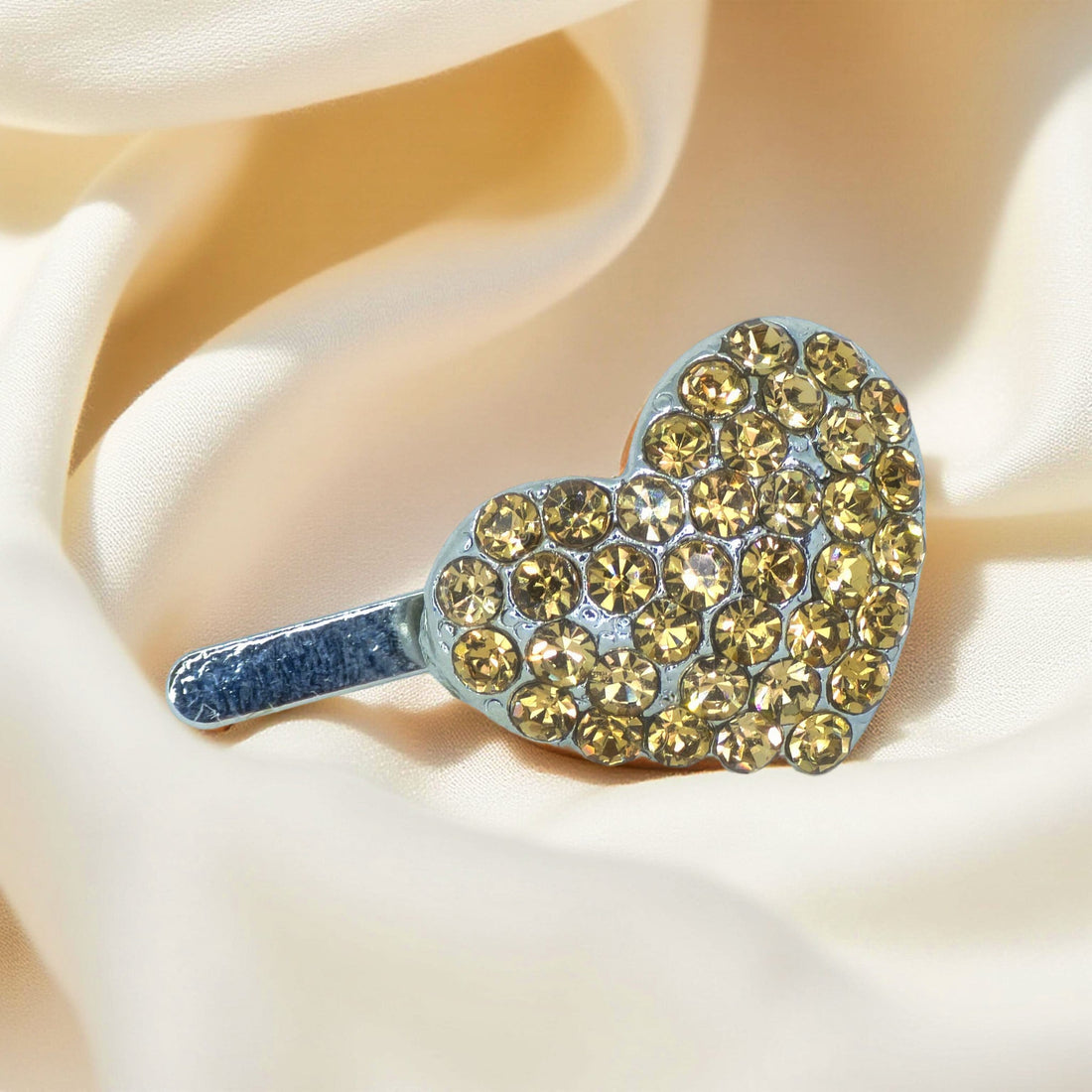 Amber version of Haerime CoeurClip – magnetic heart-shaped mini barrette with crystal coating