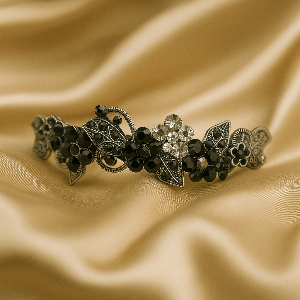 Haerime Elysia Garland Barrette in Black close-up – crystal florals and oxidized silver scrollwork detailing