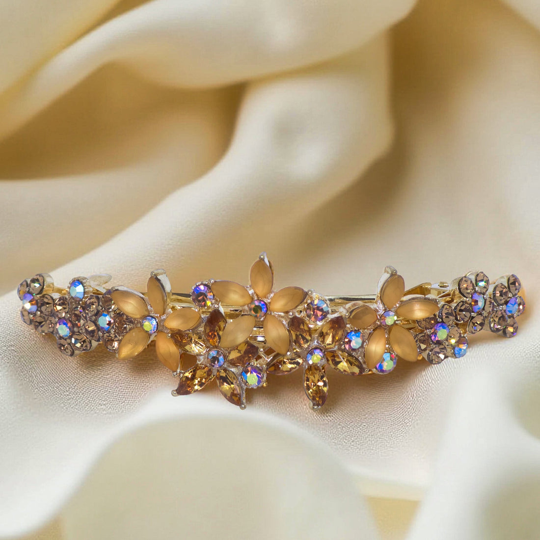 Haerime FleurVerre Cascade Barrette in Amber close-up – sunset-tone petals on antique silver scroll base