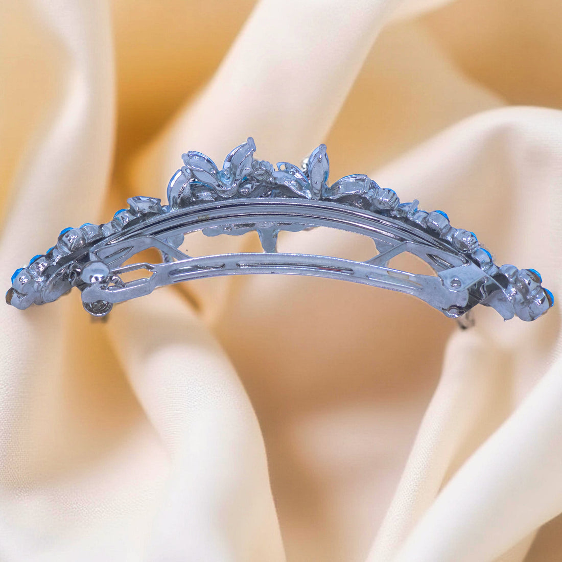 Back view of Haerime FleurVerre Cascade Barrette in Blue Zircon – hinged alligator clasp on oxidized alloy with hand-finished base plate