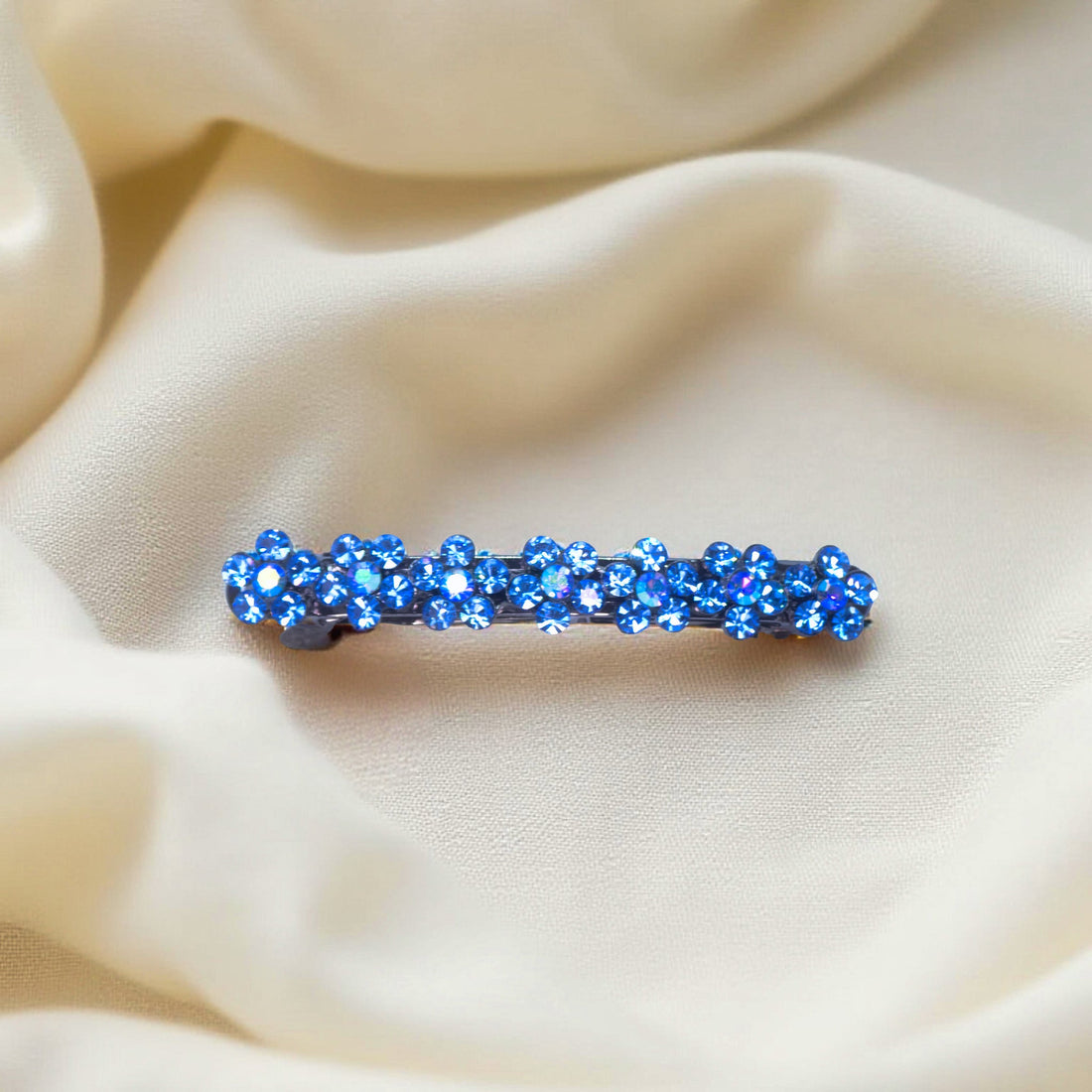 Haerime FloraDot Row Barrette in Blue close-up – hand-set blossoms and reflective petal cuts