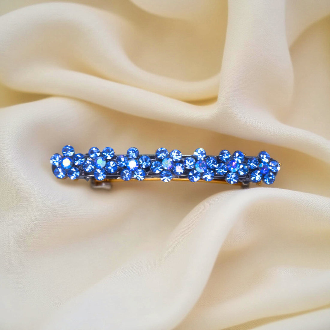 Blue version of Haerime FloraDot Row – soft sapphire-tone mini floral crystal barrette