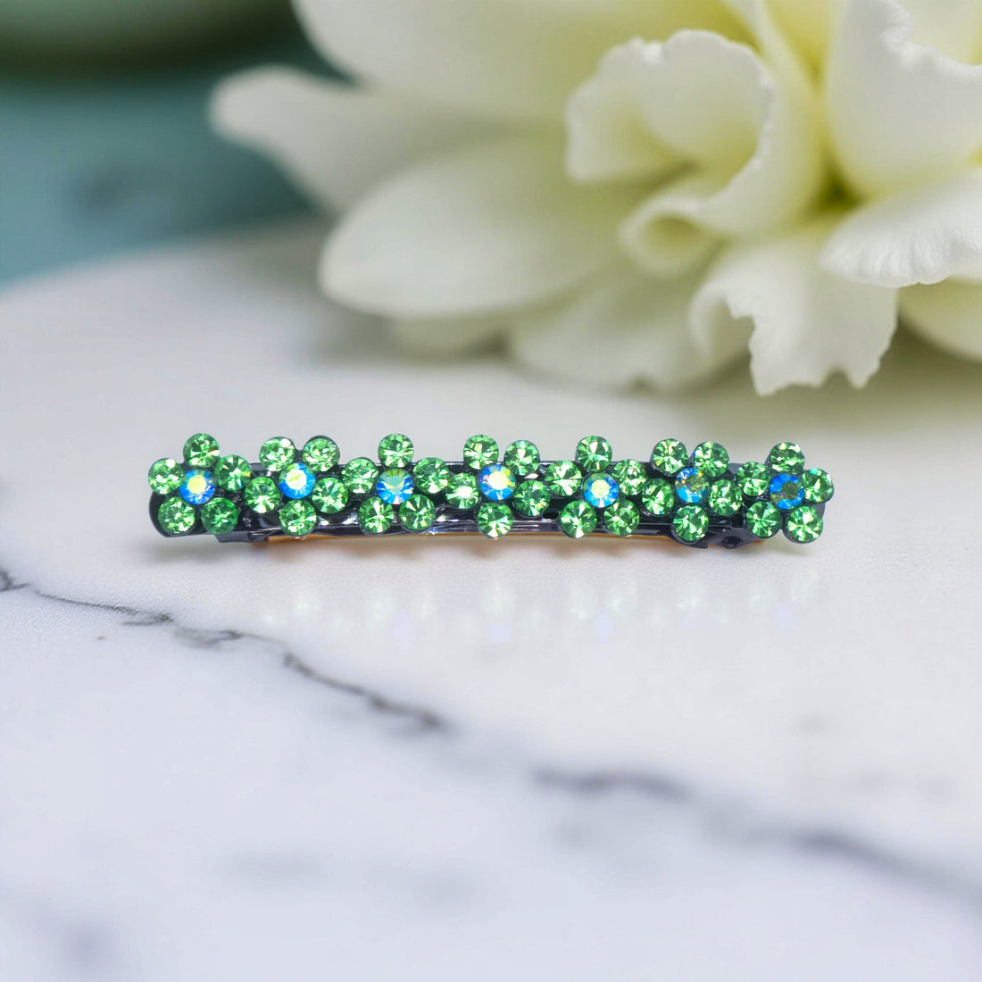 Haerime FloraDot Row Barrette in Peridot close-up – clustered bright green rhinestones on curved form