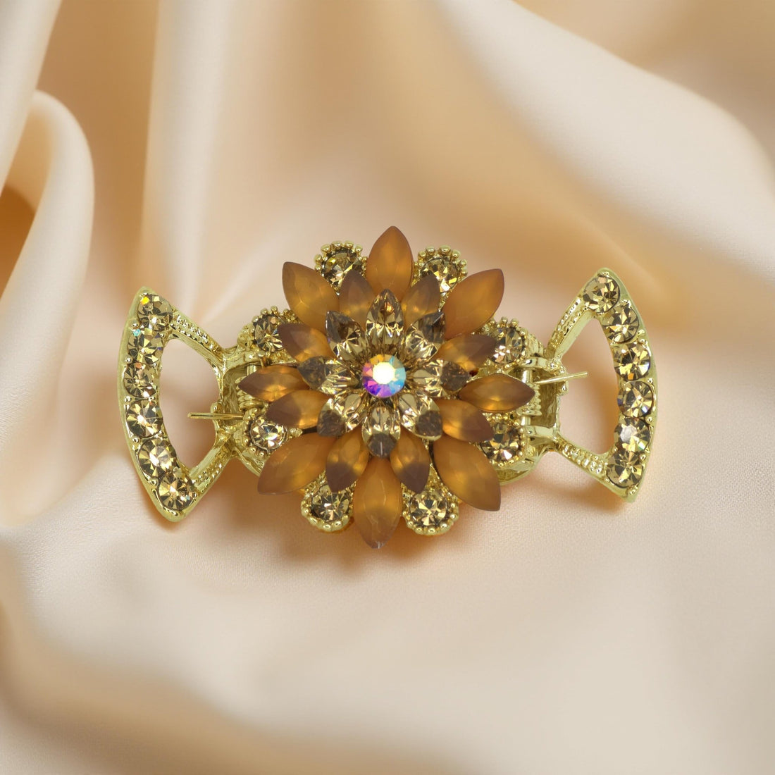 Amber version of Haerime Floréa Blossom Claw – sculpted floral jaw clip with crystal-framed wings