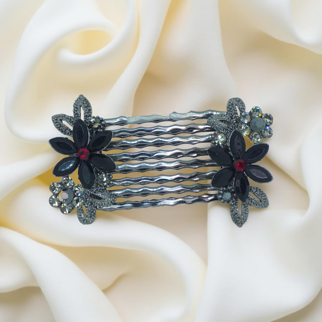 Haerime Florelle Petite Pair Combs in Black – angled pair view showing gloss petal clusters and wave-tooth grip