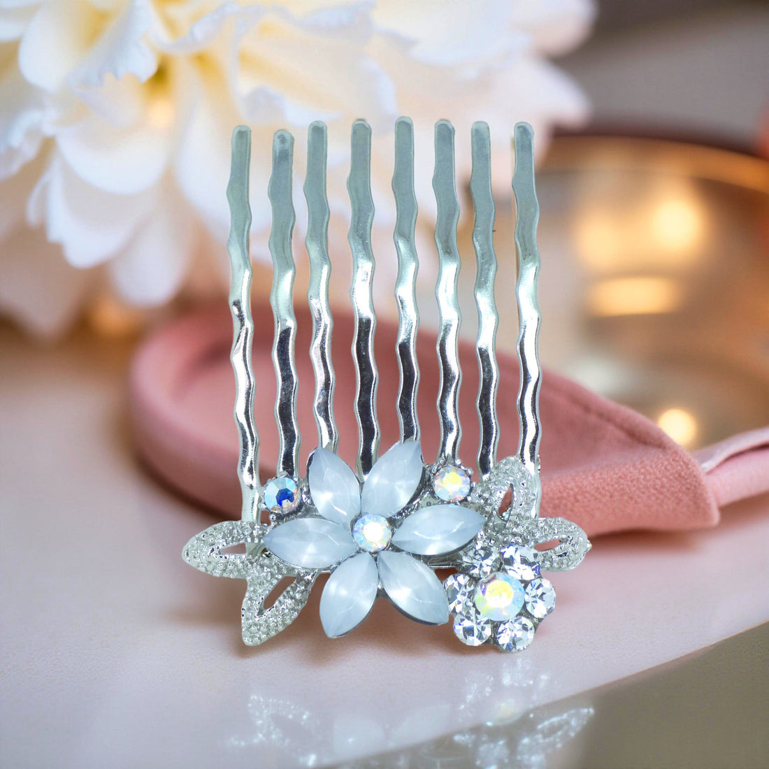 Haerime Florelle Petite Pair Combs in Clear single comb detail – crystal marquise flower over silver prong base