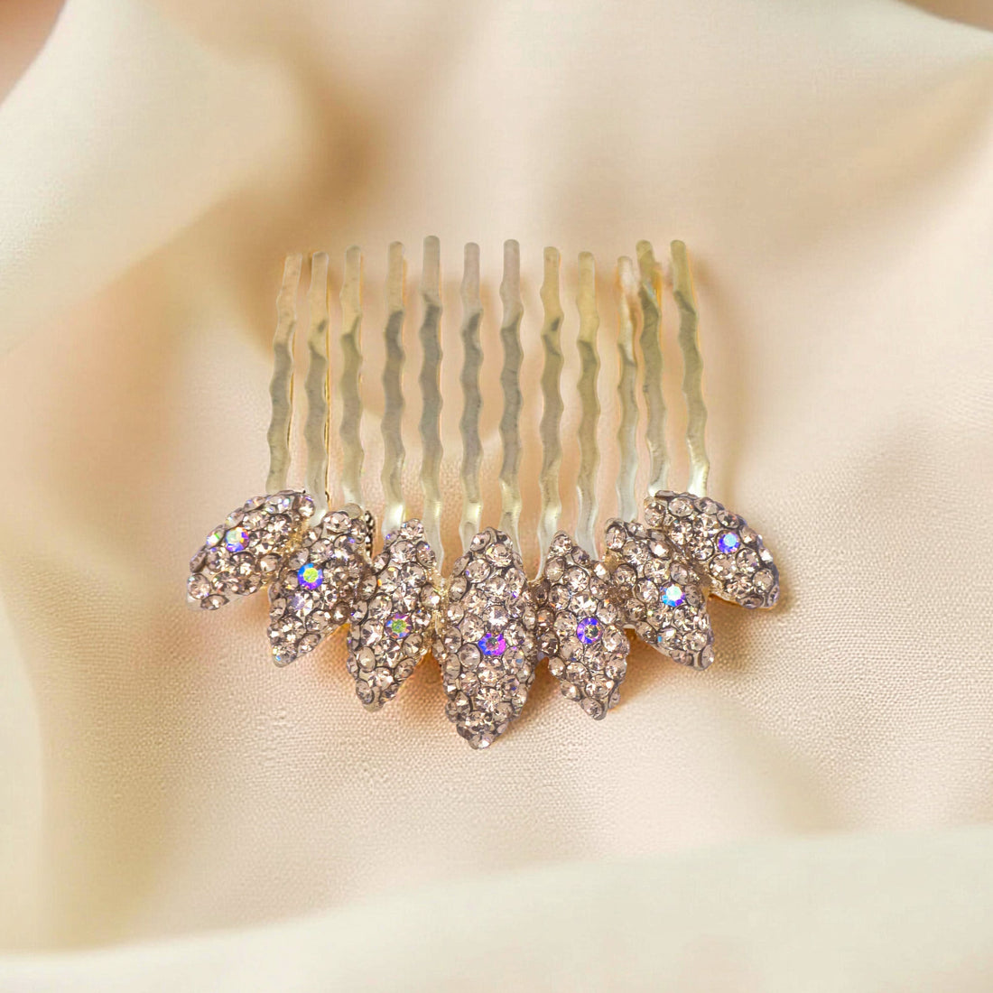 Haerime Gleamleaf Crown Comb in Amber – zoomed view highlighting warm crystal tones and detailed structure