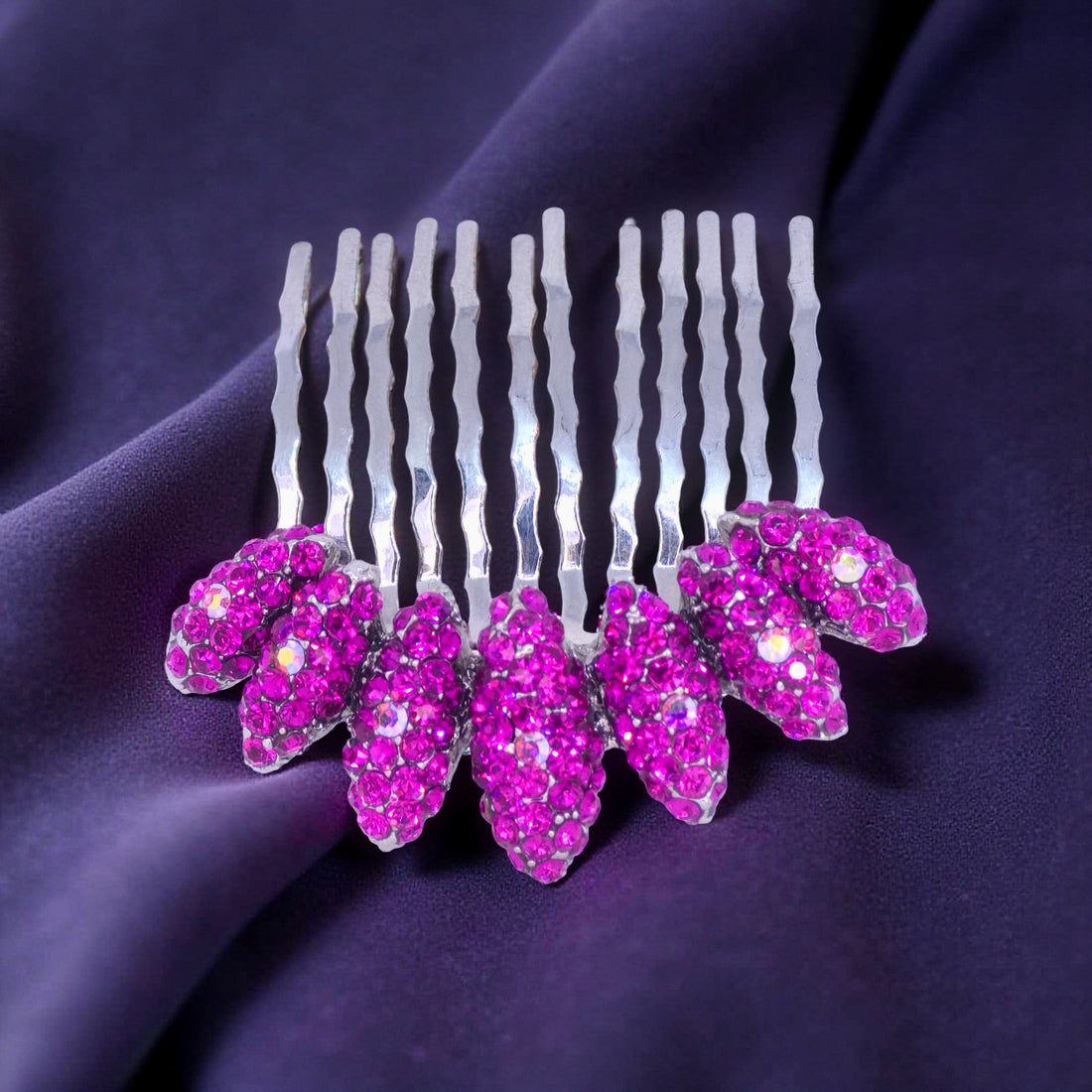Fuchsia version of Haerime Gleamleaf Crown Comb – bright pink marquise crystals on curved comb base