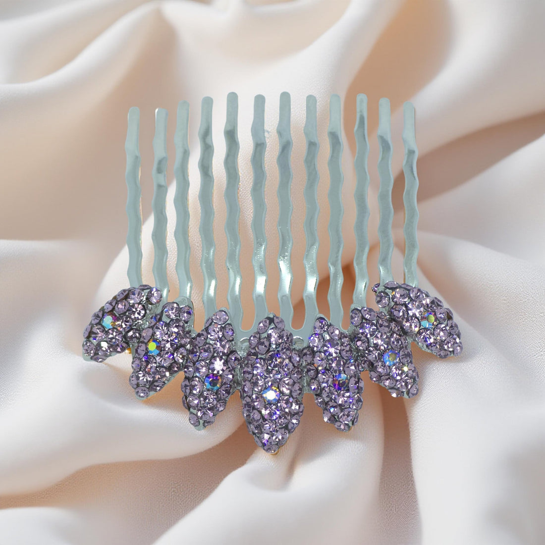 Haerime Gleamleaf Crown Comb in Purple – detail of faceted marquise crystals and silver prongs