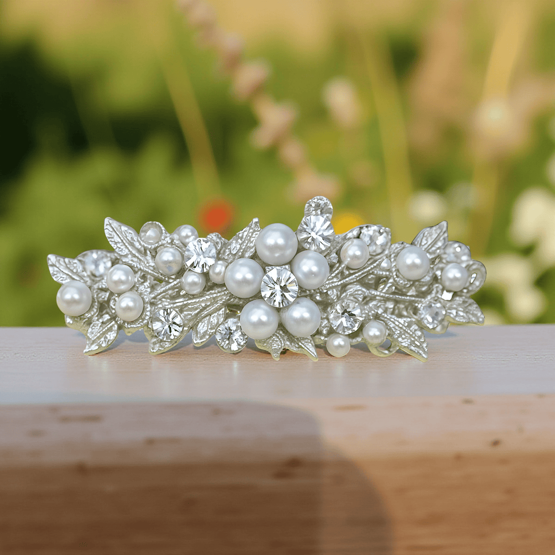 Haerime Lumielle Frost Barrette in Pearl – angled close-up capturing floral curves and bridal shimmer with pearl cluster