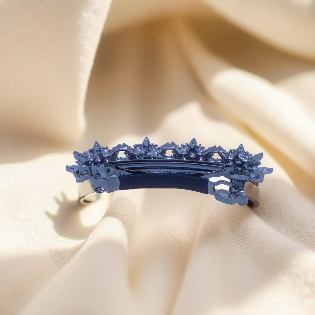 Haerime Luna Halo Barrette in Clear – reverse view showing black-plated French clasp and crystal-set backplate for secure grip