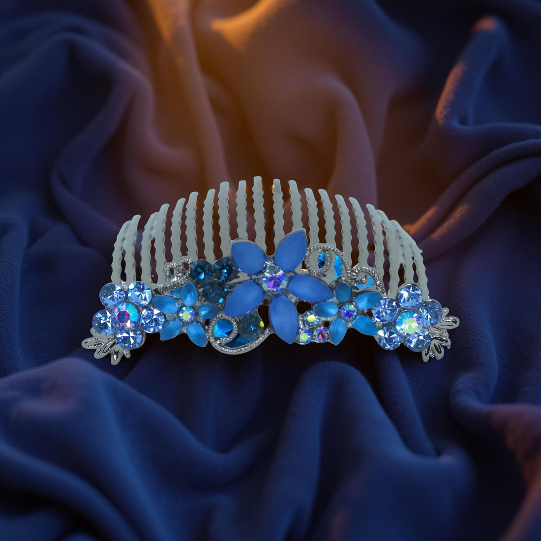 Haerime Lunaria Vine Comb in Blue – close-up of vivid sapphire stones and swirling silver detailing