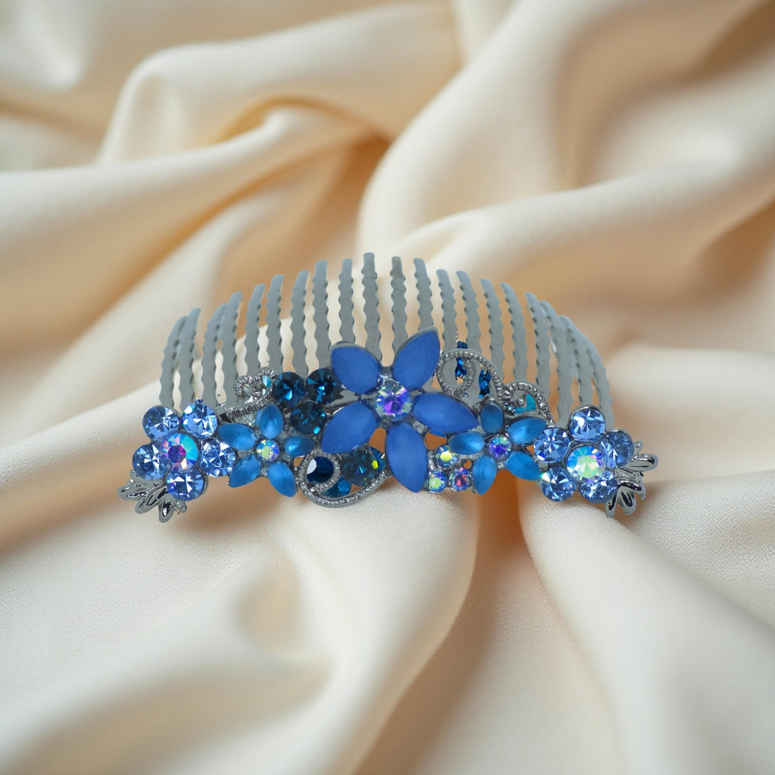 Haerime Lunaria Vine Comb in Blue – flat top view showing ocean blue crystal blooms and curved comb teeth