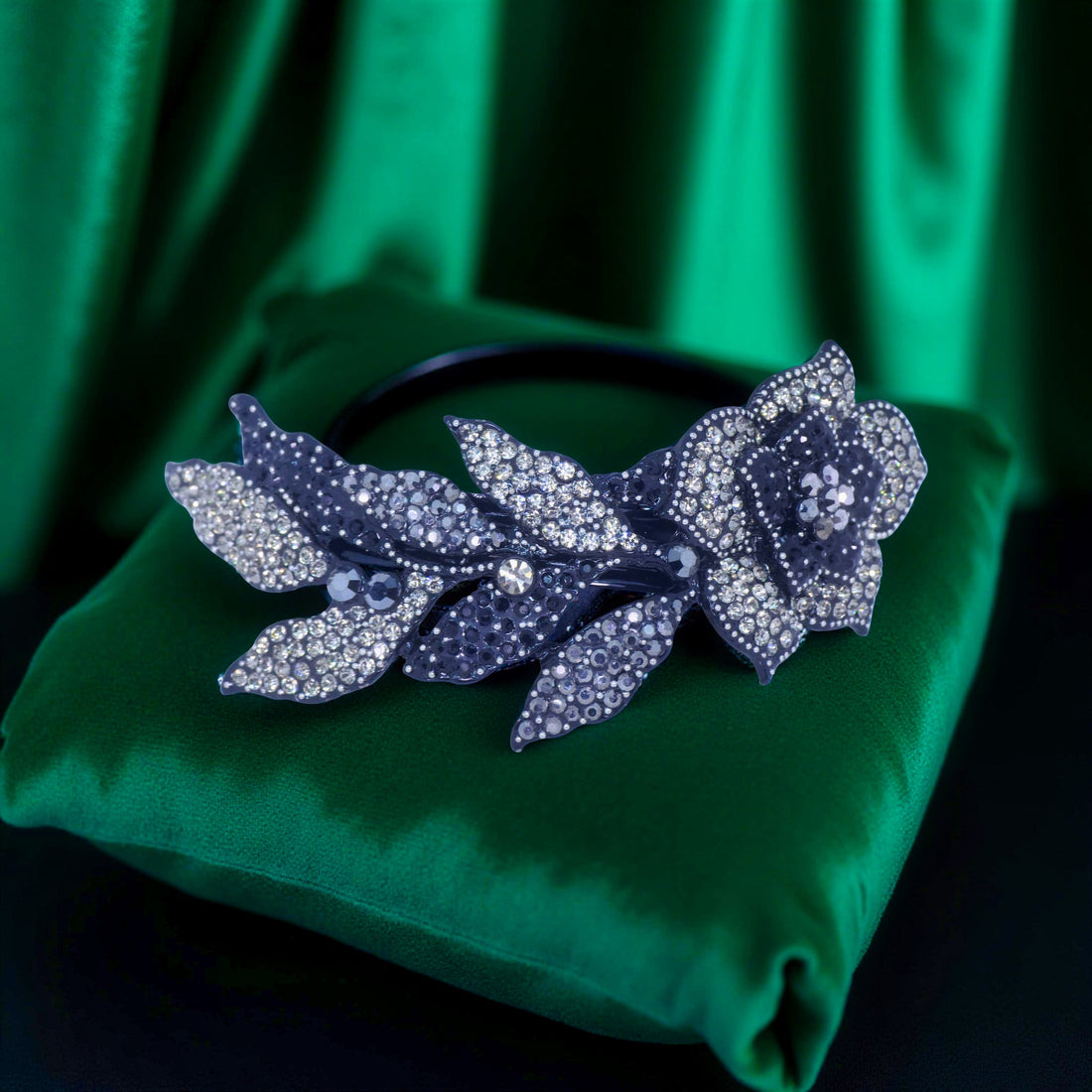 Haerime Midnight Bloom Barrette in Black – flat view with jet black floral silhouette and silver-edge contrast