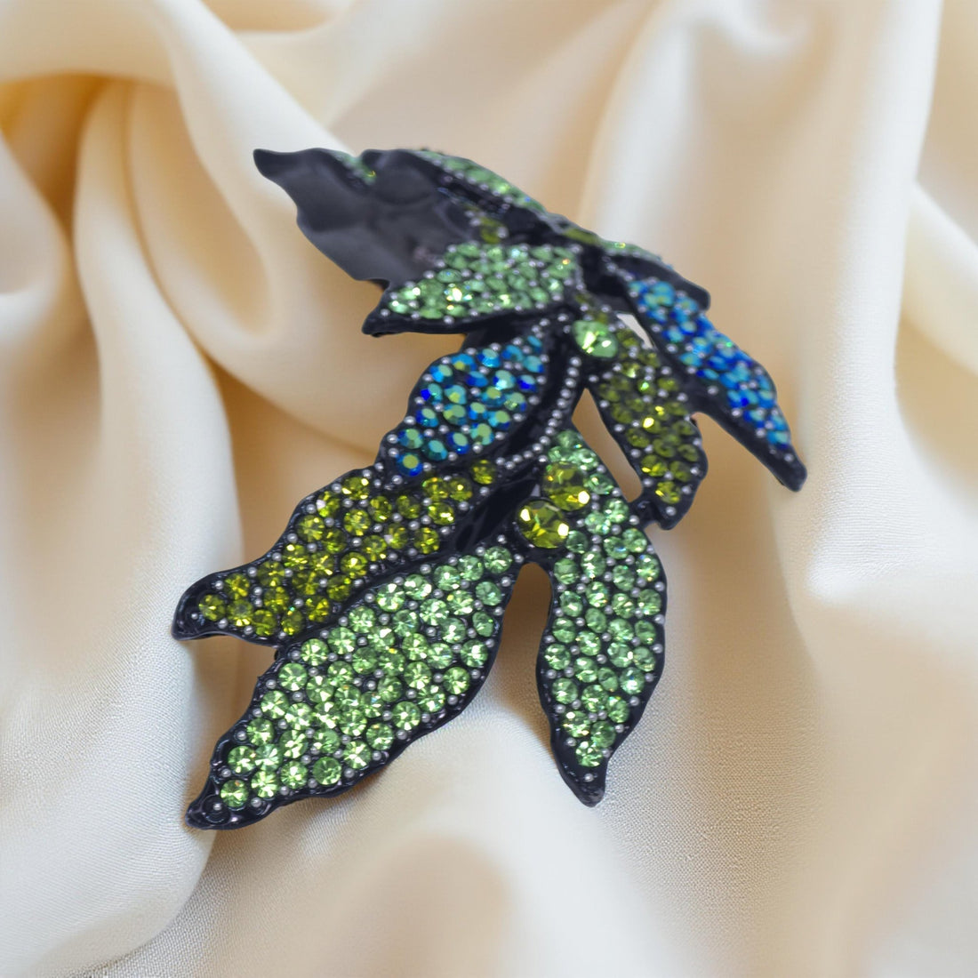Haerime Midnight Bloom Barrette in Mint – alternate side angle highlighting open floral structure and aqua-blend pavé