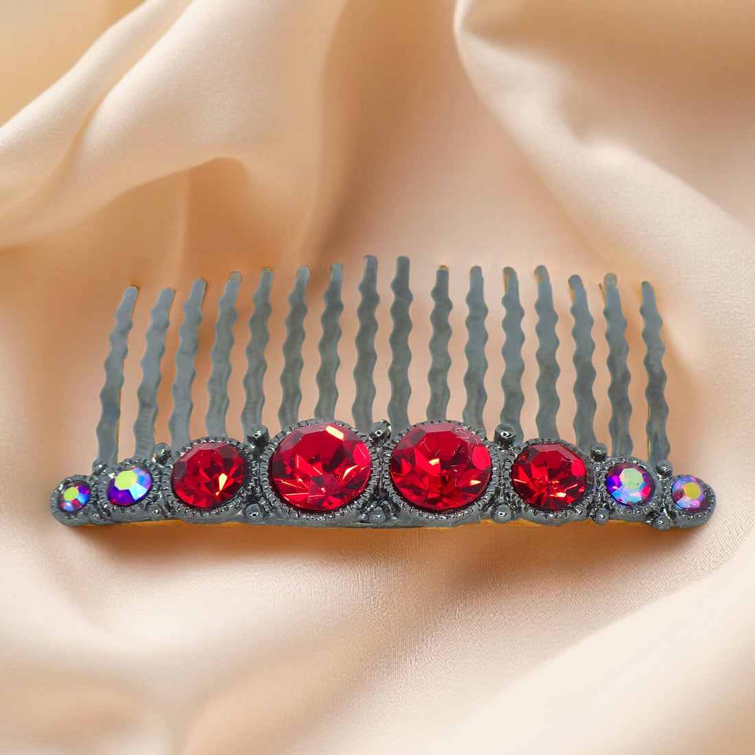 Haerime Ornette Classic Comb in Red – zoomed view of ruby-tone bezel crystals on darkened silver comb