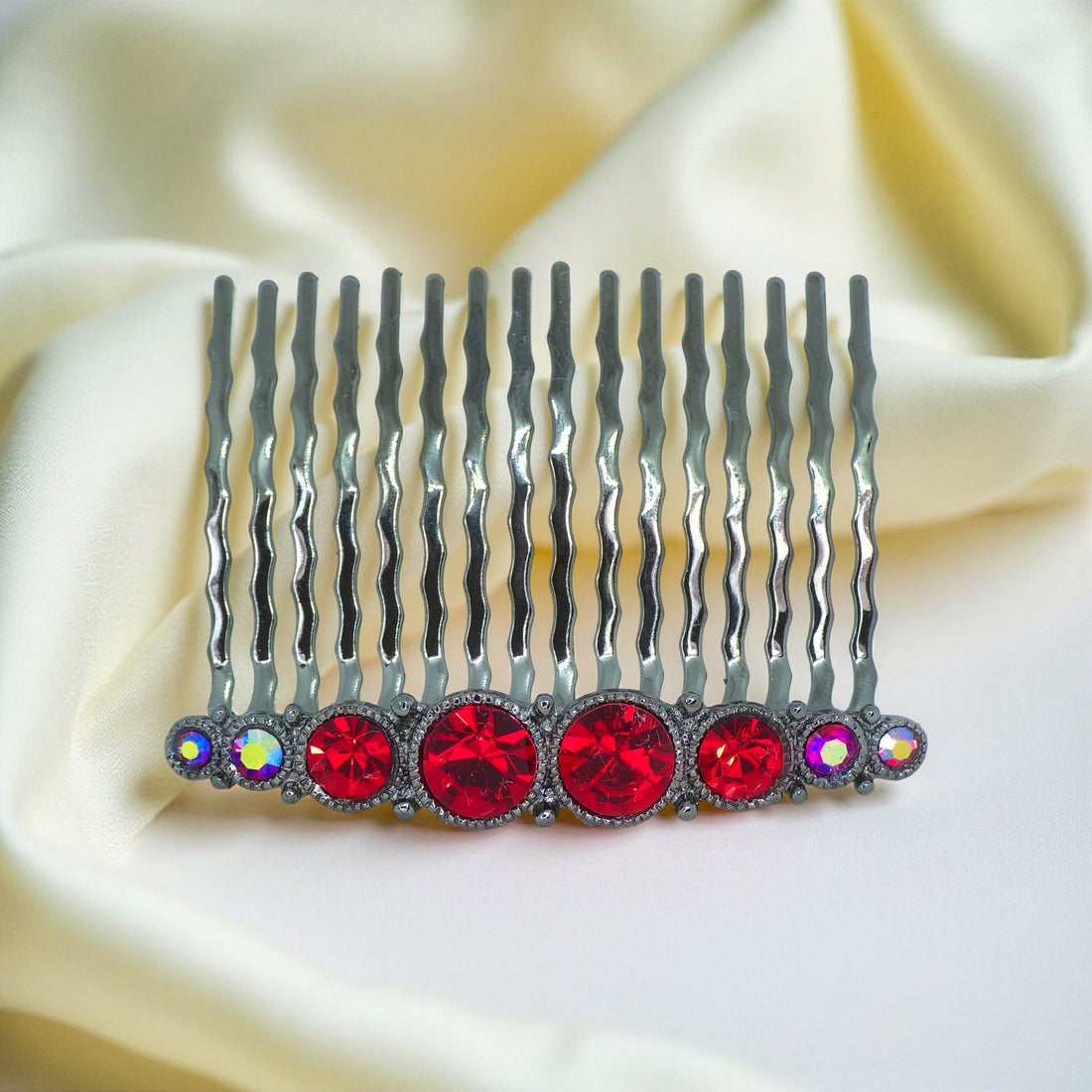 Haerime Ornette Classic Comb in Red – top view of bold red crystal bar with 12 waved prongs and oxidized frame