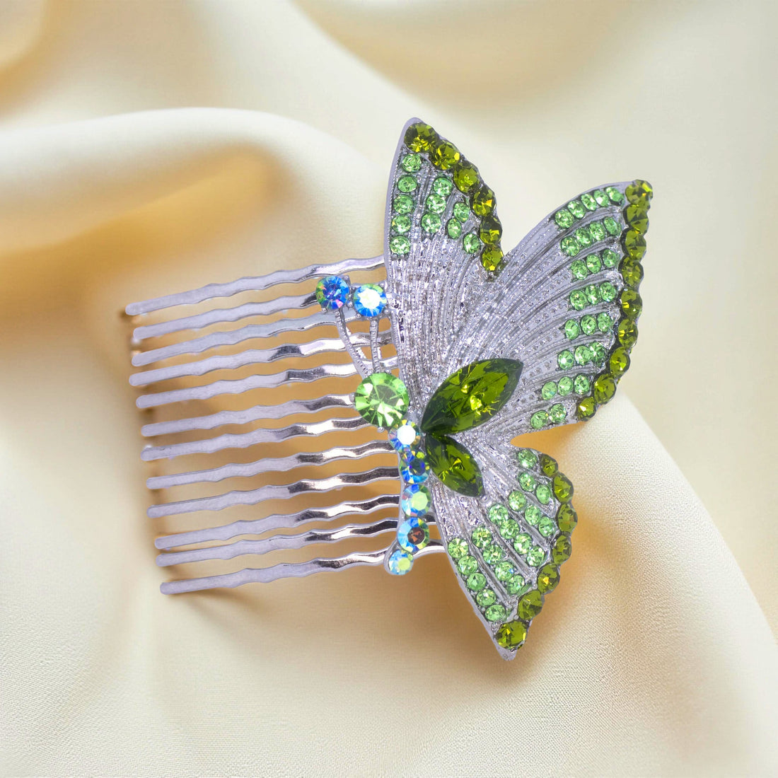 Haerime Papillora Twin Comb in Peridot – fresh green pavé comb shown on soft tan velvet with curved symmetry
