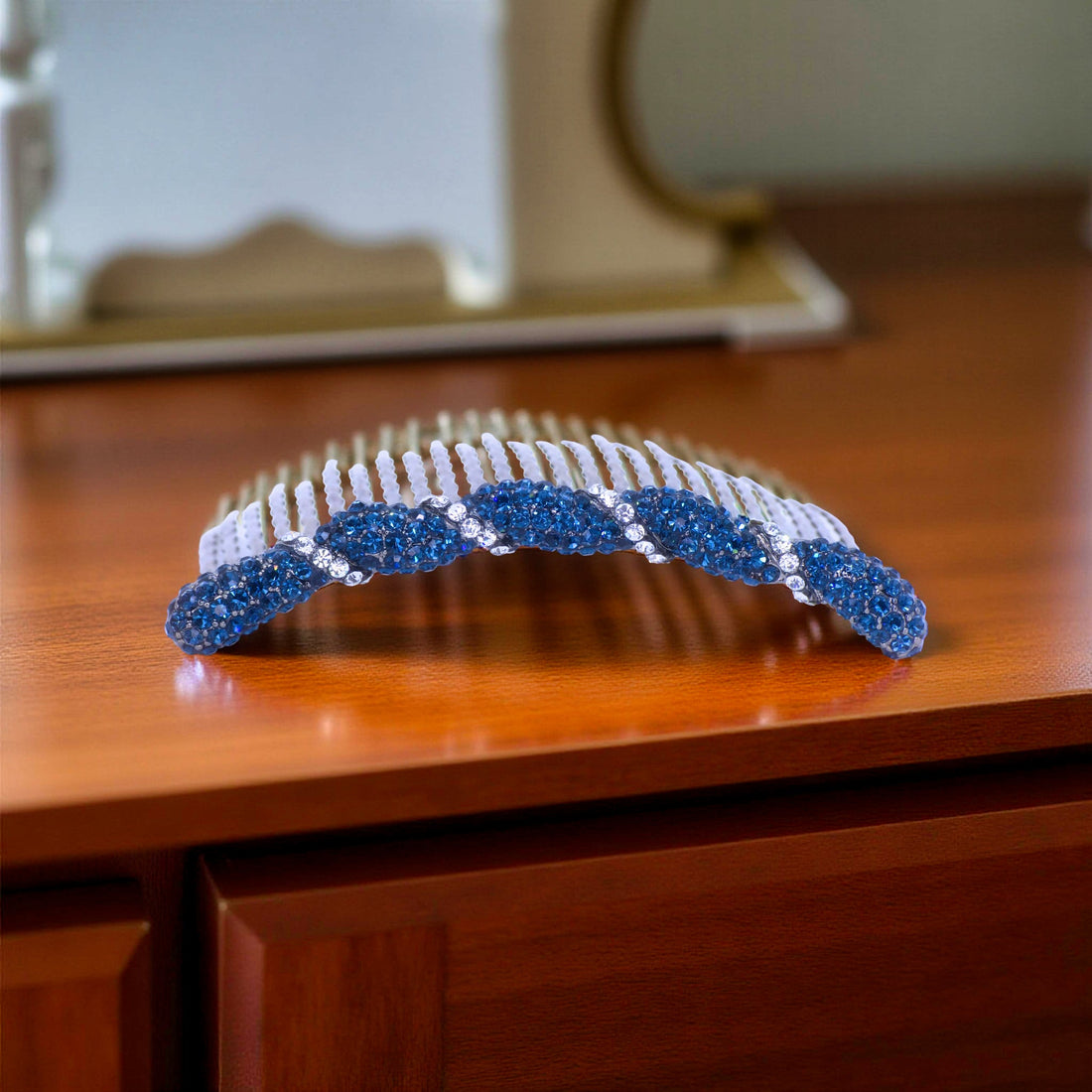 Haerime Seraphine Twist Comb in Navy – deep navy pavé arc comb resting on folded satin with cool reflective tones