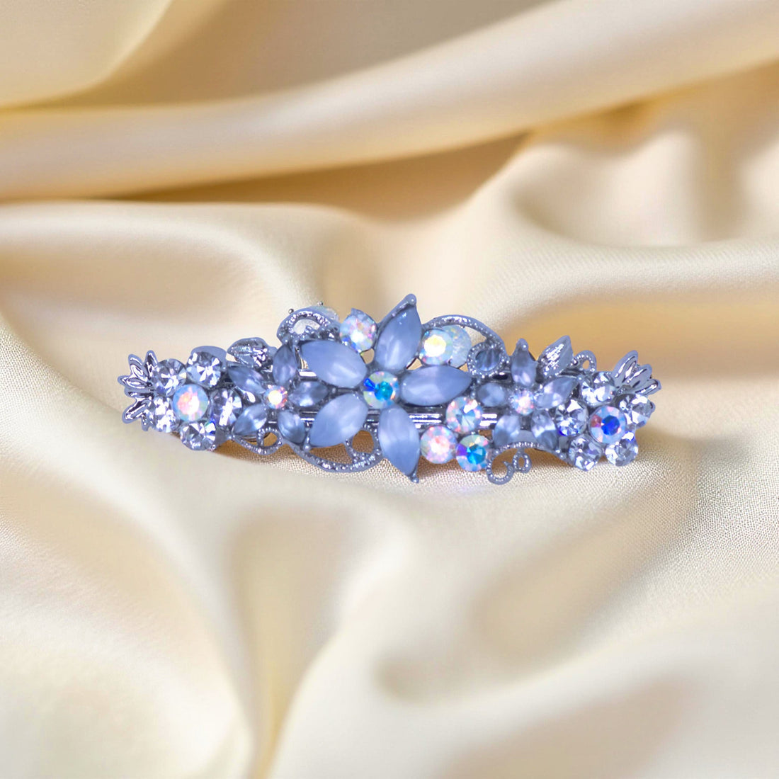 Haerime Serenbelle Bloom in Clear – clear floral barrette with frosted pavé gems laid on champagne satin folds