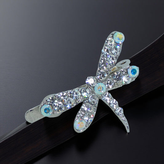 Haerime Aeris Wing Clip in Clear – crystal dragonfly barrette on black velvet