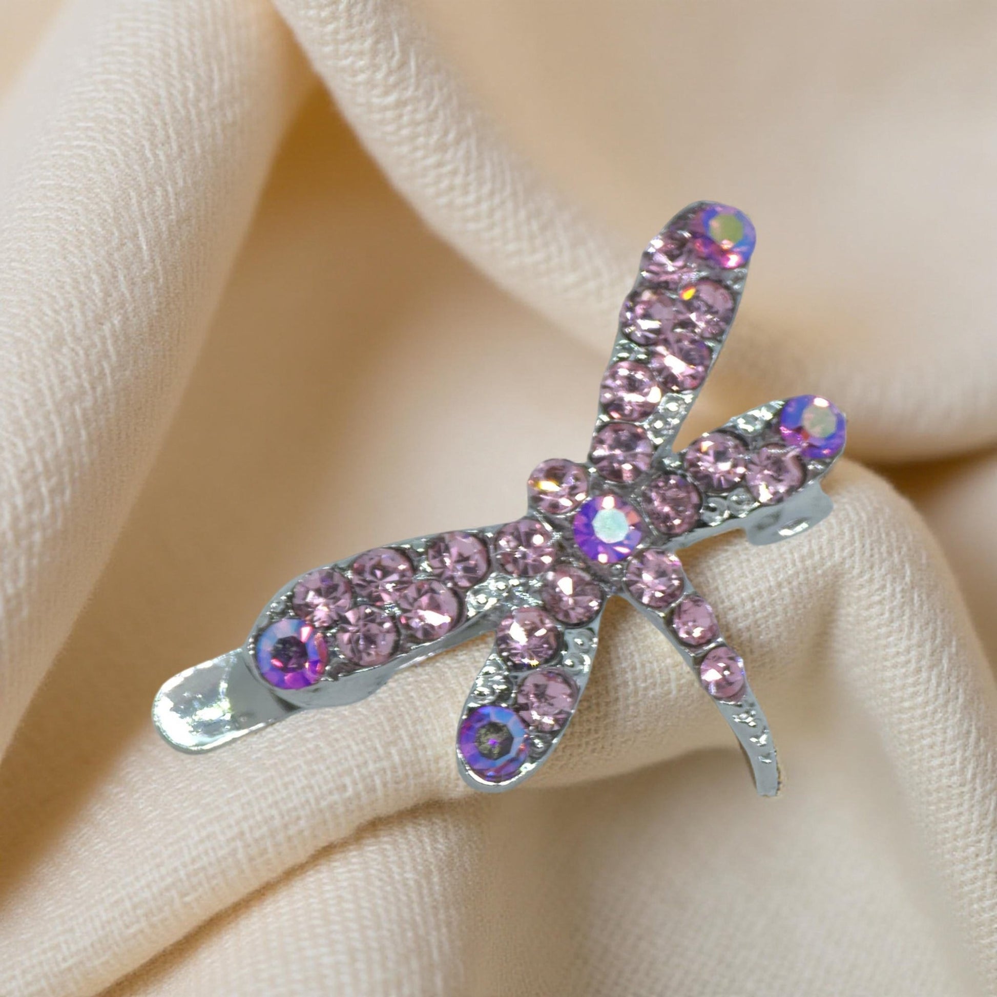 Delicate pink crystal wings of the Haerime Aeris Wing Clip – detail angle