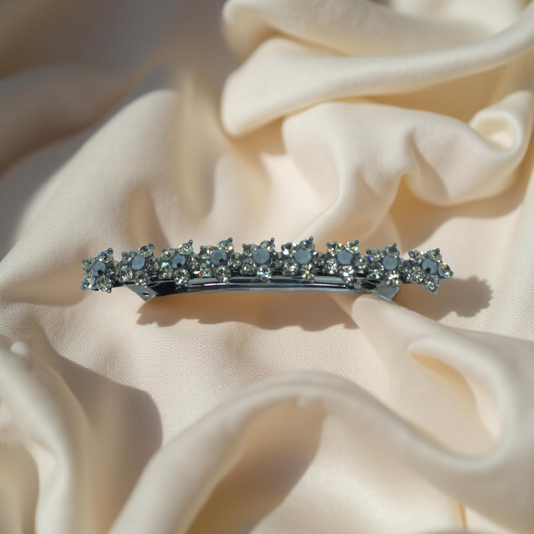Black version of Haerime Aureflor Arc – single-row floral barrette with hand-set rhinestones