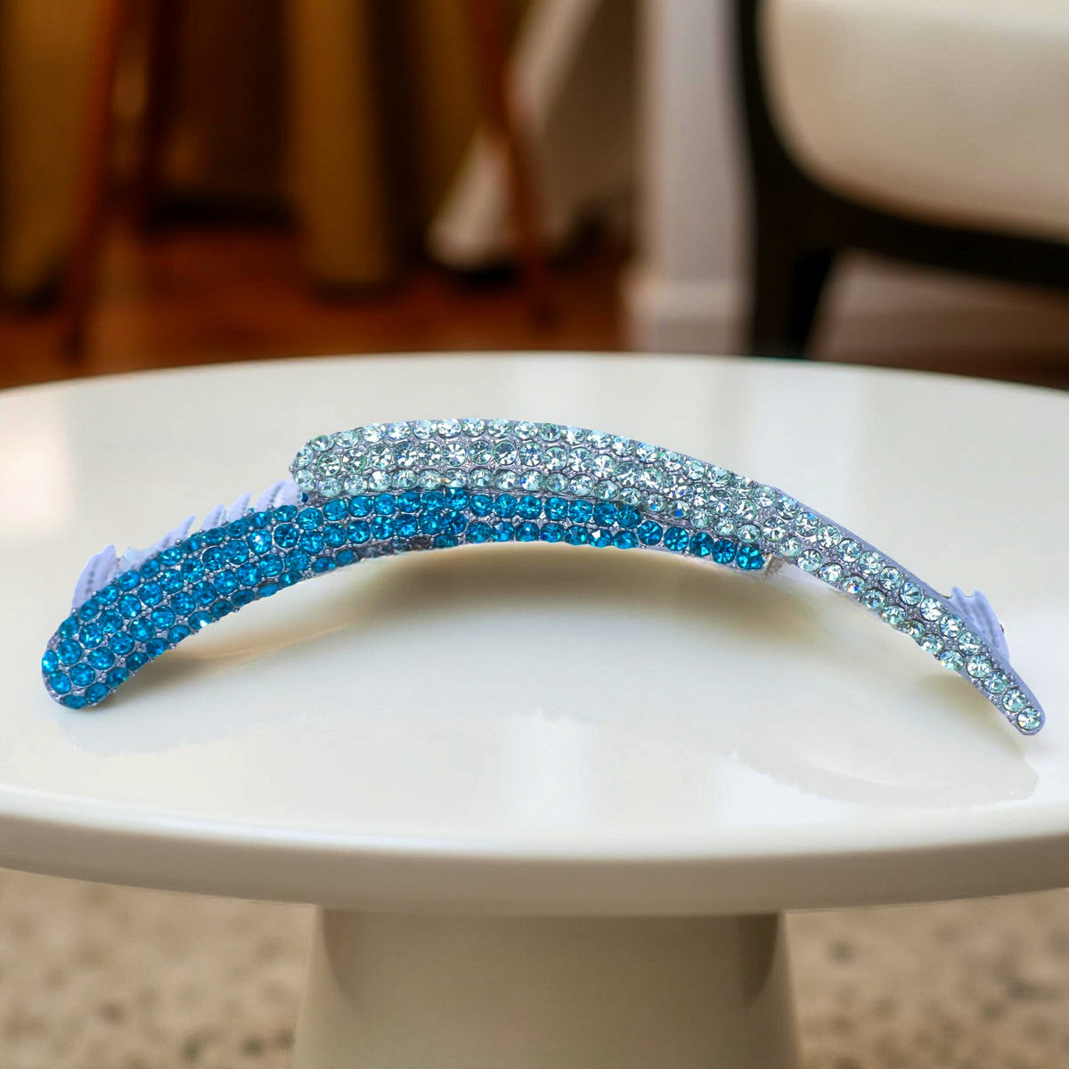 Aurelya Dual Arc hair accessory, Blue Zircon color option, side view.