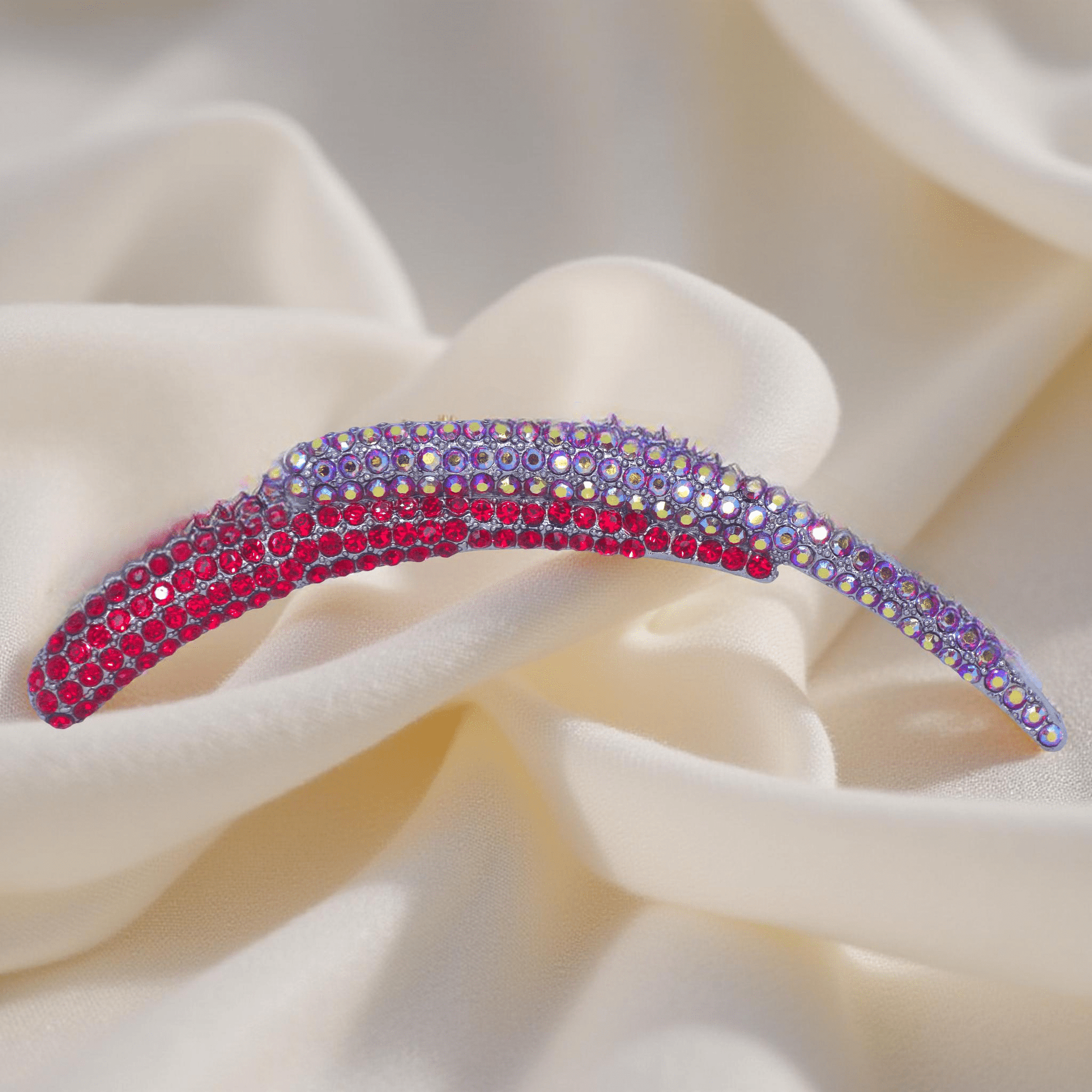 Haerime Aurelya Dual Arc Comb in Red showing curved pavé design and dual arc silhouette