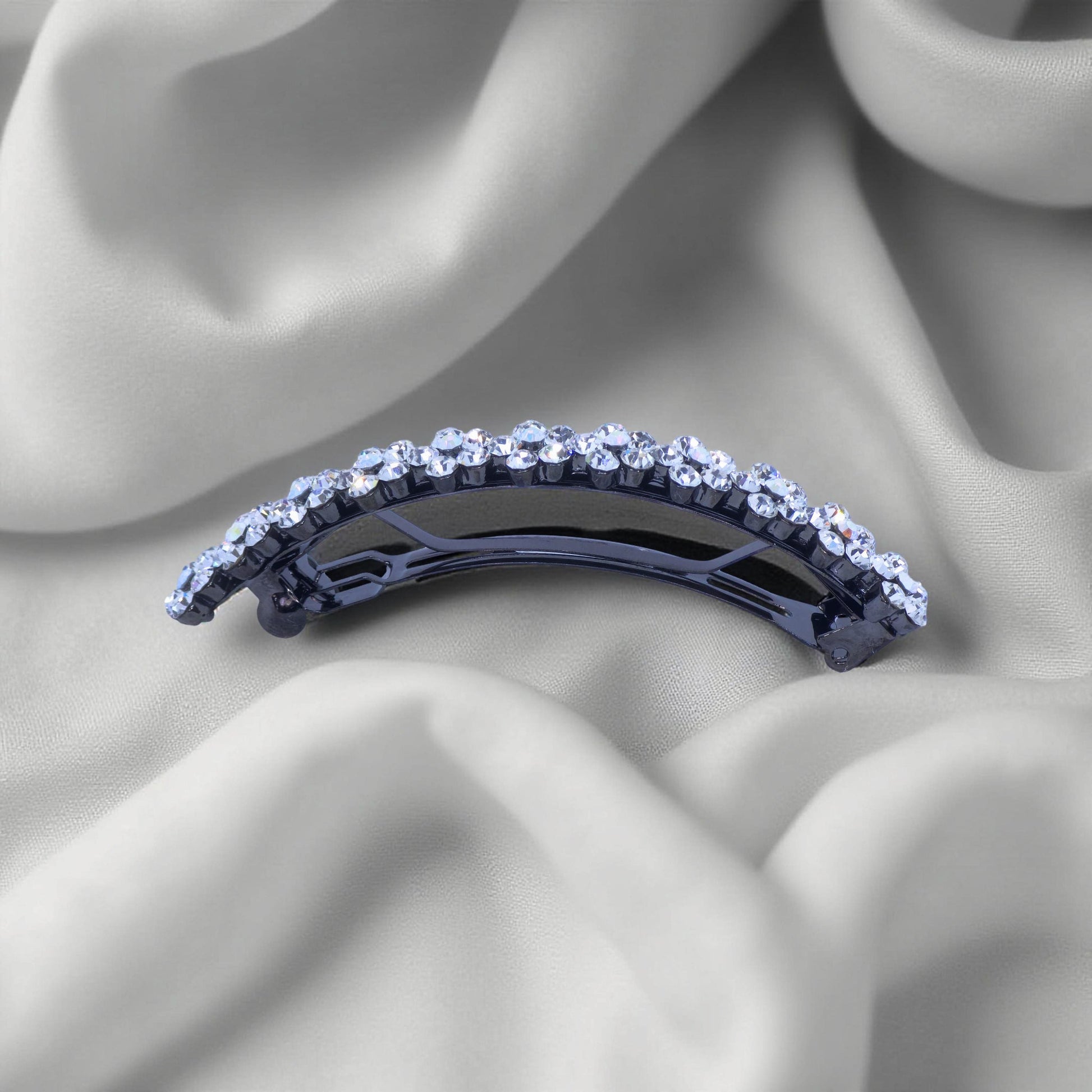 Horizontal side view of Haerime Blosselina Row Barrette in Clear – soft arch and crystal arrangement
