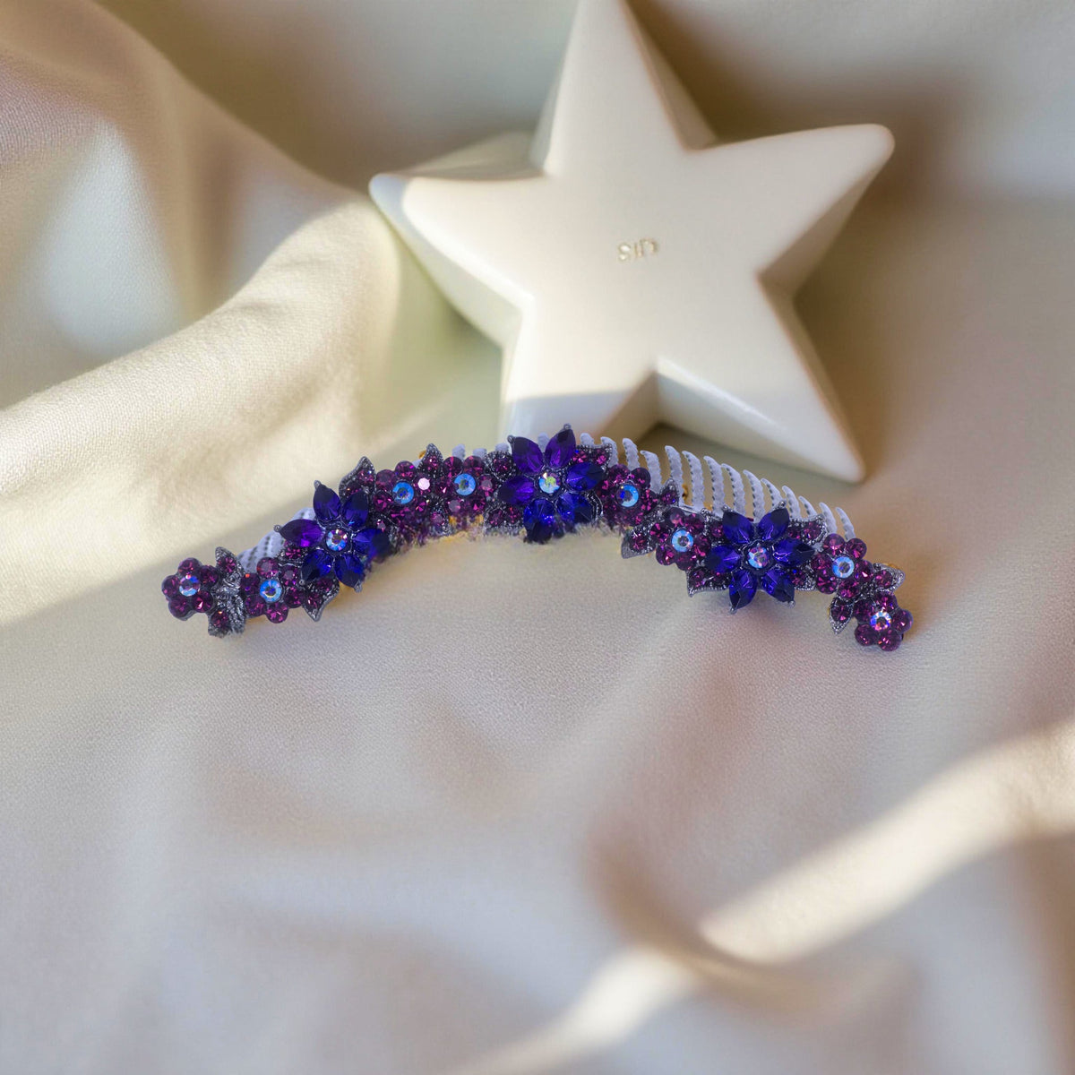 Purple version of Haerime Celestara Crown Comb – luminous scrollwork and blossoms