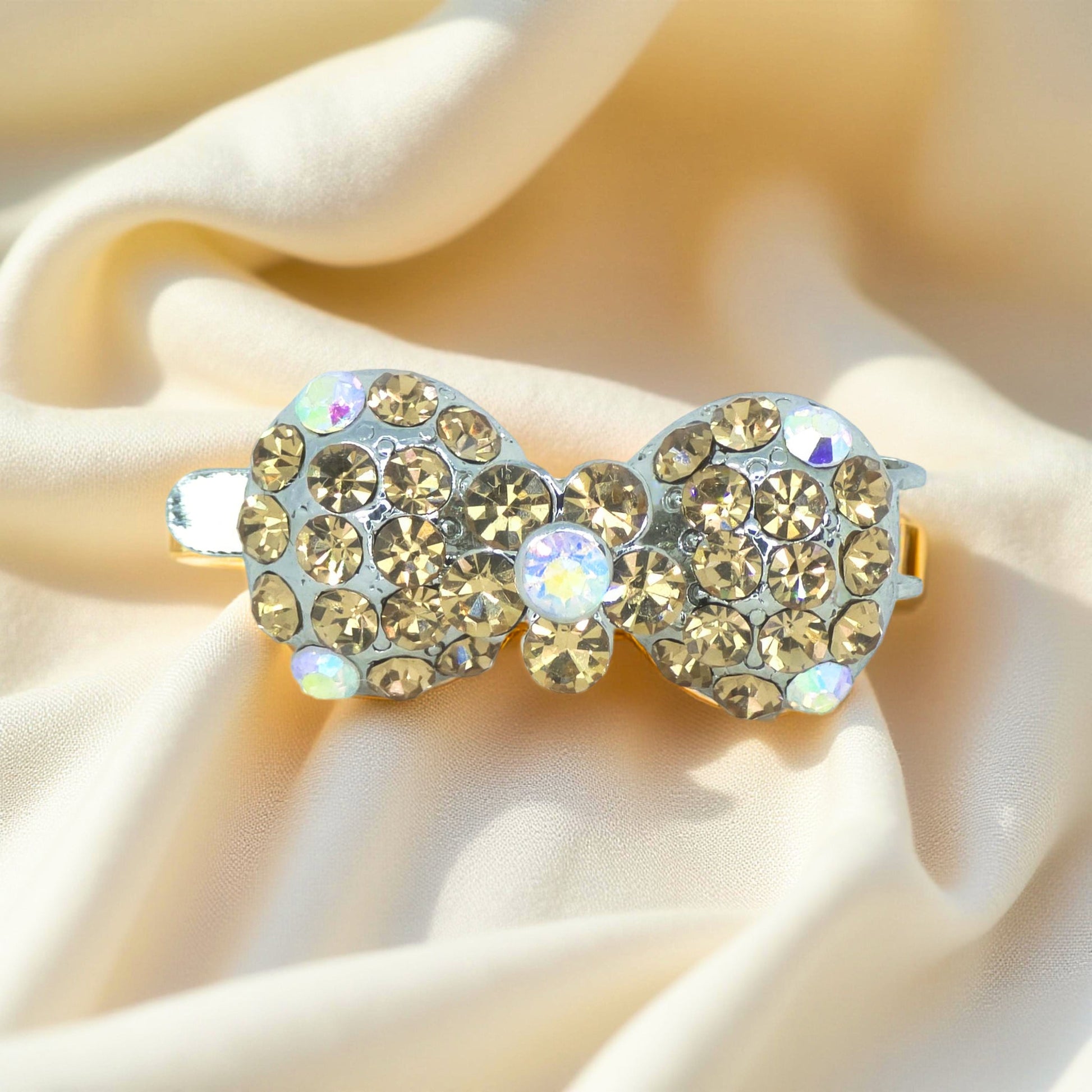 Amber version of Haerime Chérie Clip – magnetic mini bow hair clip with crystal detailing