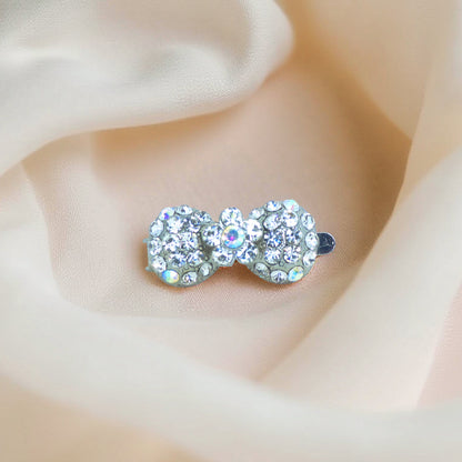 Chérie Mini Bow hair clip, product view.