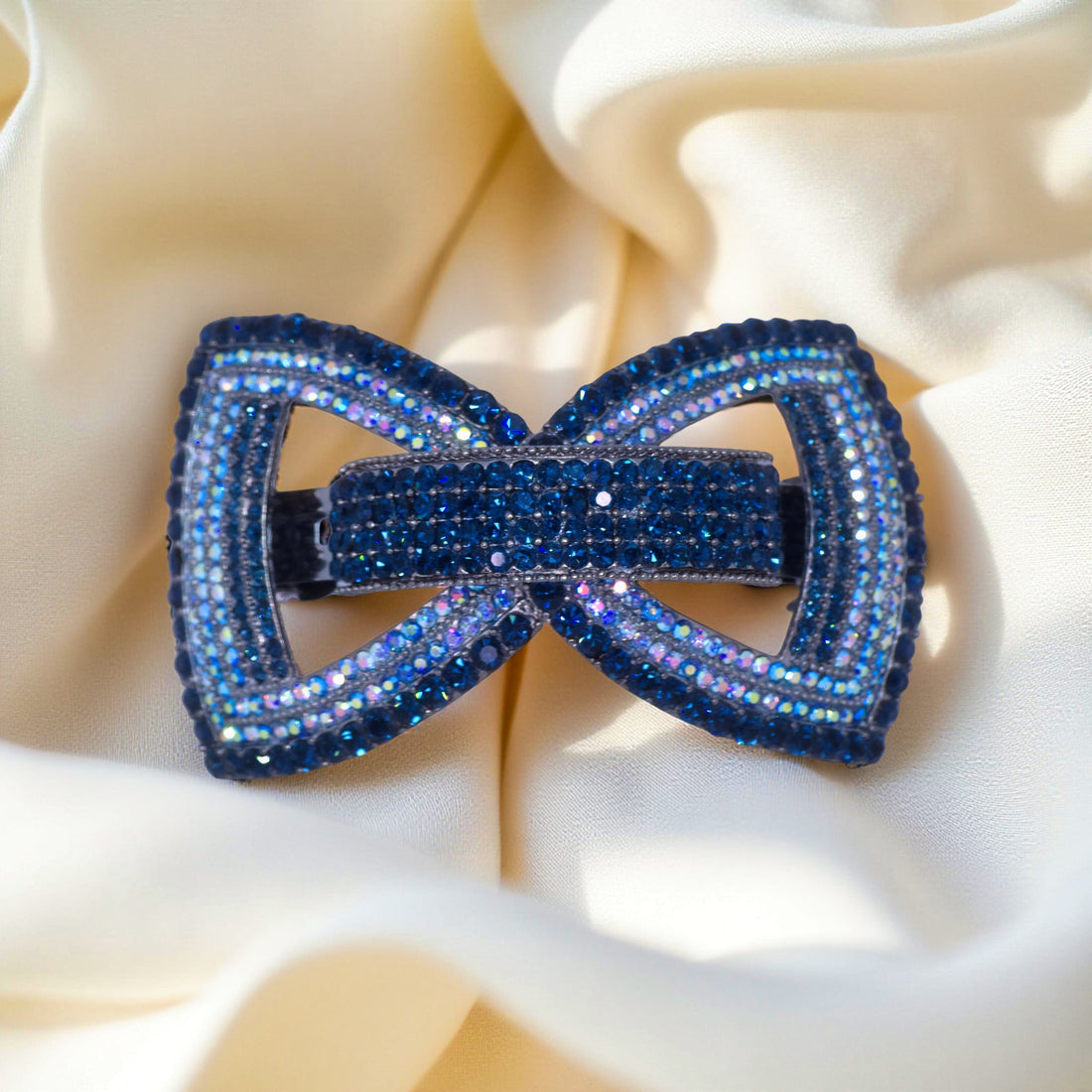 Blue version of Haerime Ecliptique Bow – rich sapphire-toned crystal barrette with polished gloss base
