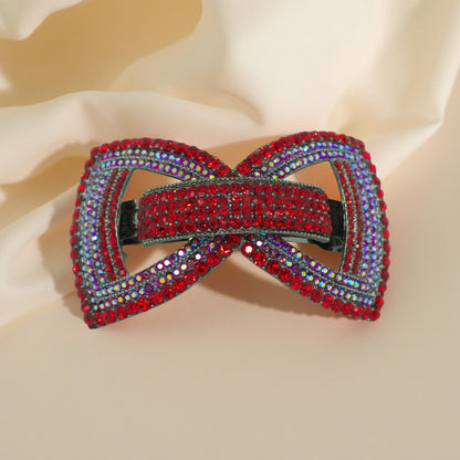 Ecliptique Bow barrette, product view.