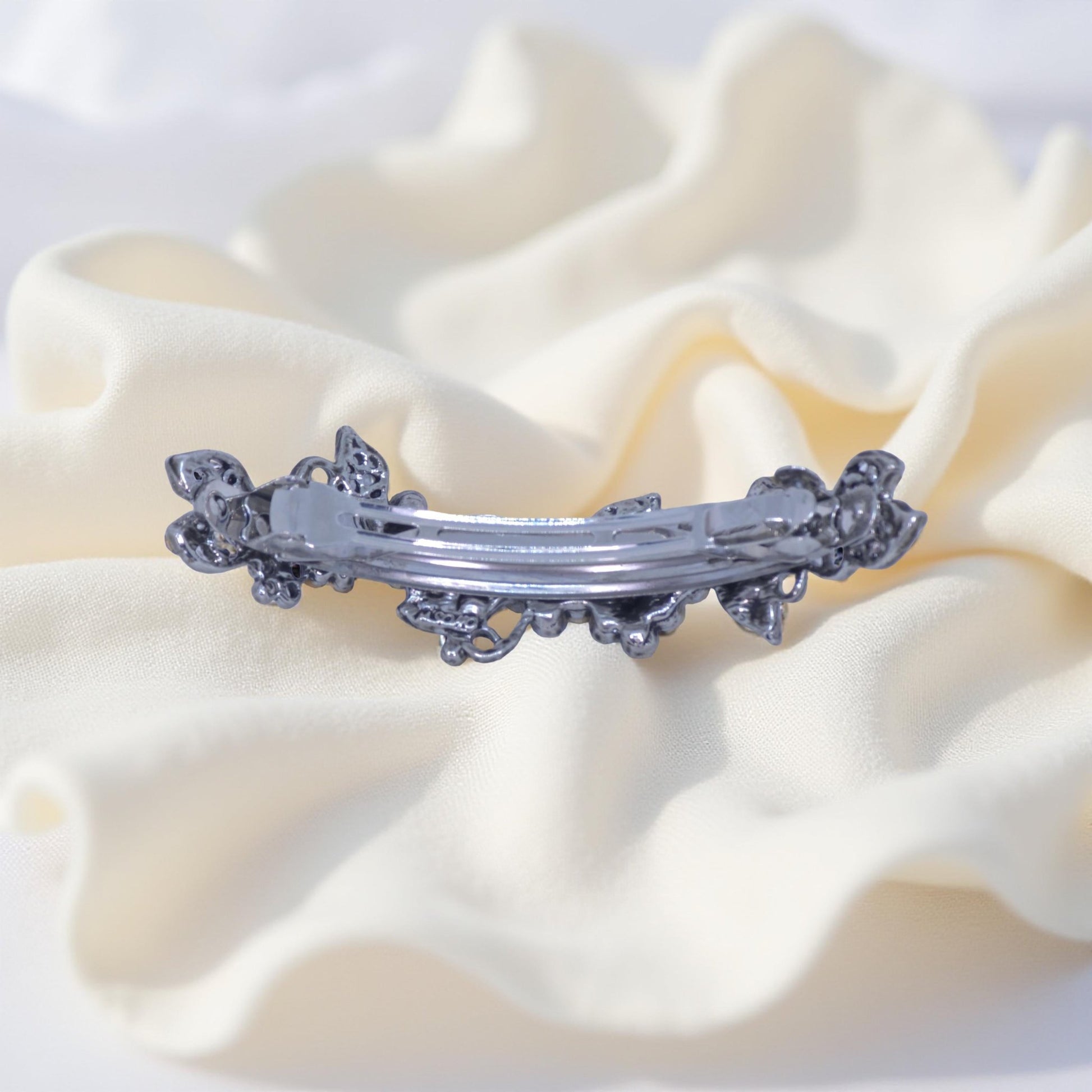 Back view of Haerime Elysia Garland Barrette in Blue – secure alligator clasp with vintage finished underframe